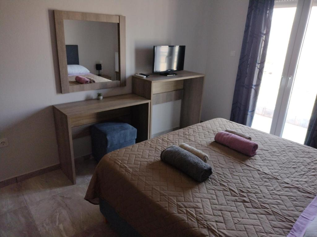 Postel nebo postele na pokoji v ubytování "Thea" Valis Apartments