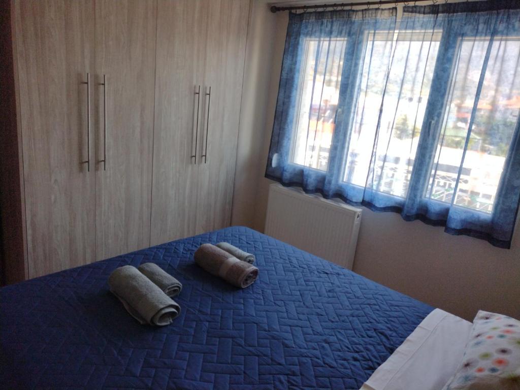 Postel nebo postele na pokoji v ubytování "Thea" Valis Apartments