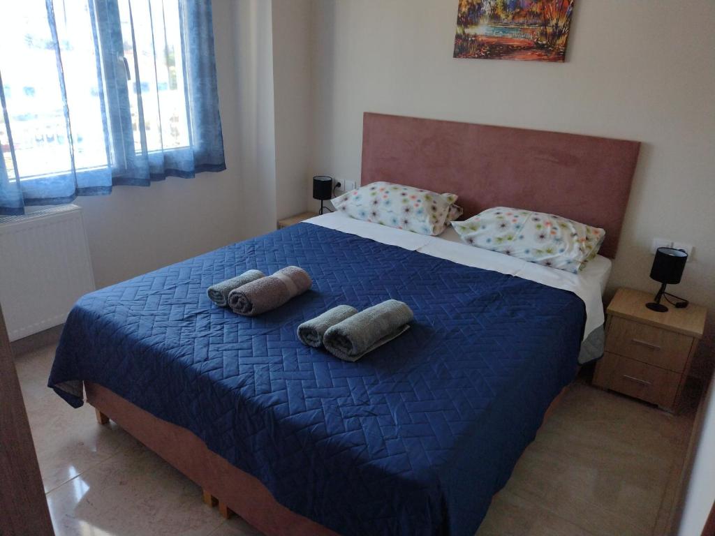 Postel nebo postele na pokoji v ubytování "Thea" Valis Apartments