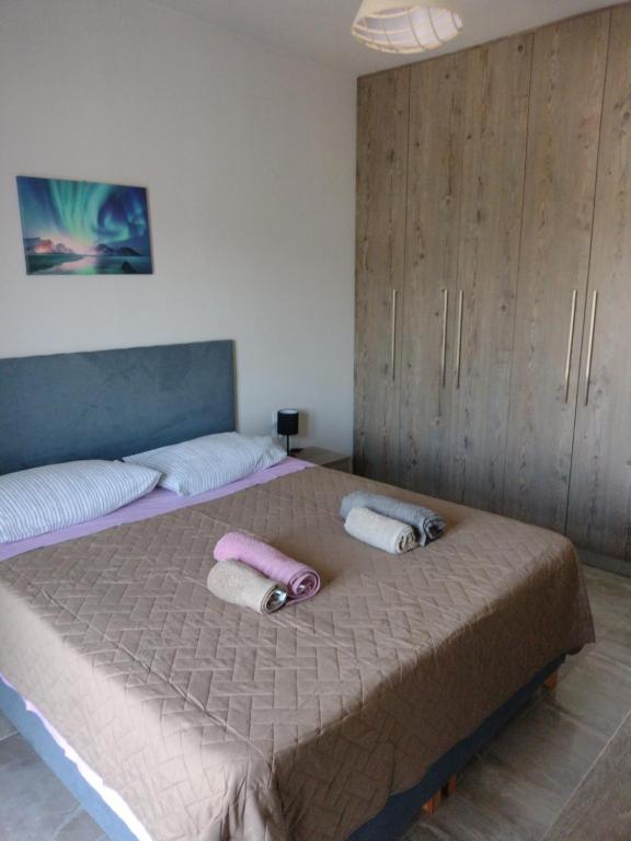Postel nebo postele na pokoji v ubytování "Thea" Valis Apartments