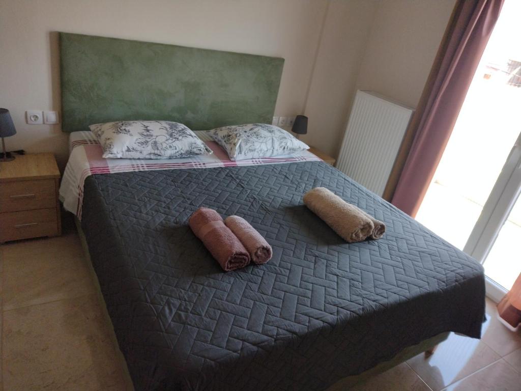 Postel nebo postele na pokoji v ubytování "Thea" Valis Apartments
