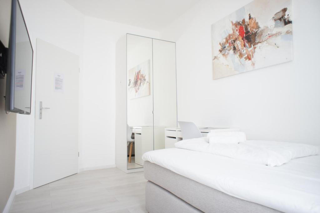 Postel nebo postele na pokoji v ubytování Hotel Böke Rheinfelden