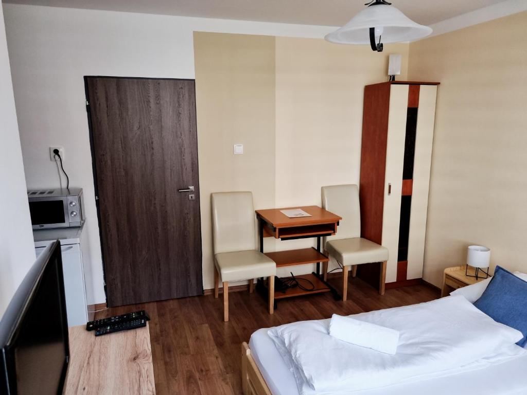 Postel nebo postele na pokoji v ubytování Ubytovani-prostejov