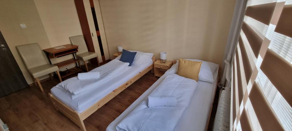 Postel nebo postele na pokoji v ubytování Ubytovani-prostejov
