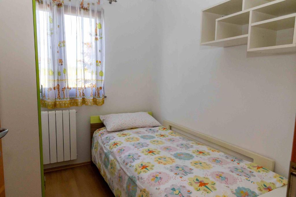 Posteľ alebo postele v izbe v ubytovaní COUNTRY HOUSE NINA