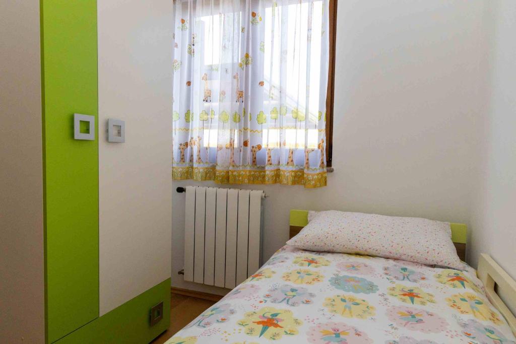 Posteľ alebo postele v izbe v ubytovaní COUNTRY HOUSE NINA