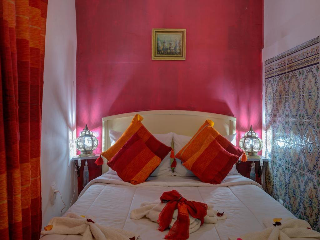 Postel nebo postele na pokoji v ubytování Riad Lazorde De Marrakech