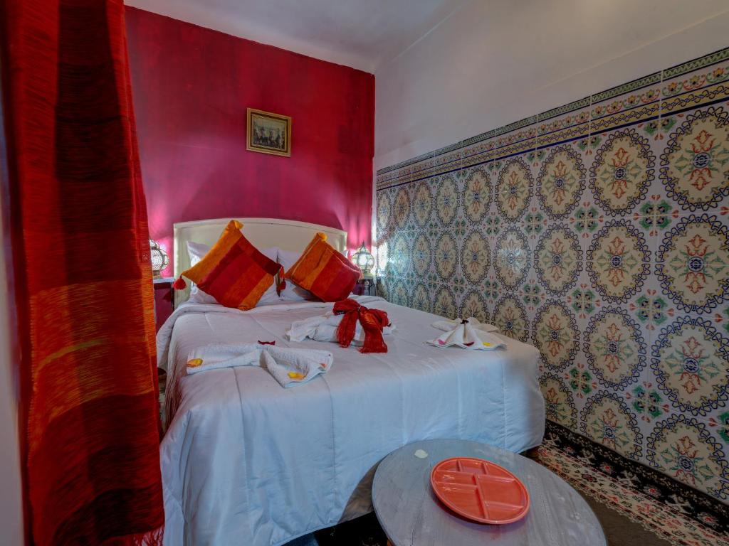 Postel nebo postele na pokoji v ubytování Riad Lazorde De Marrakech