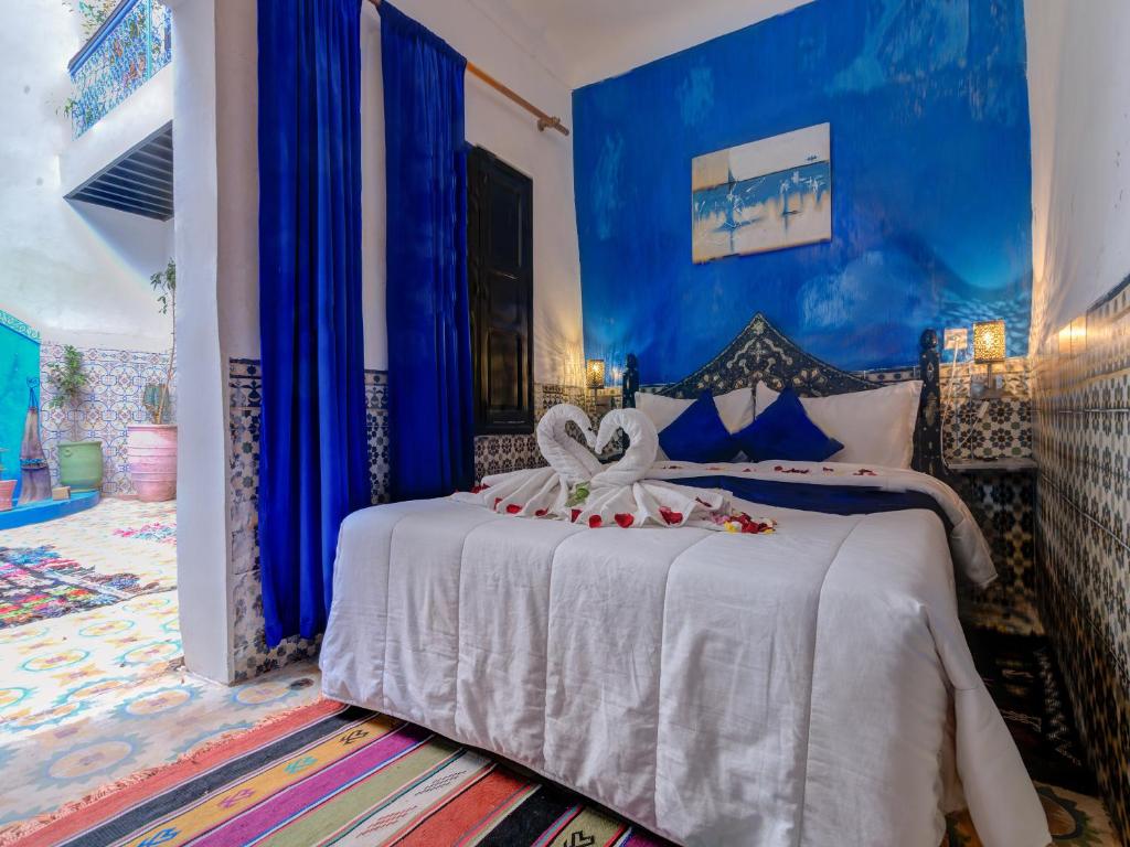 Postel nebo postele na pokoji v ubytování Riad Lazorde De Marrakech