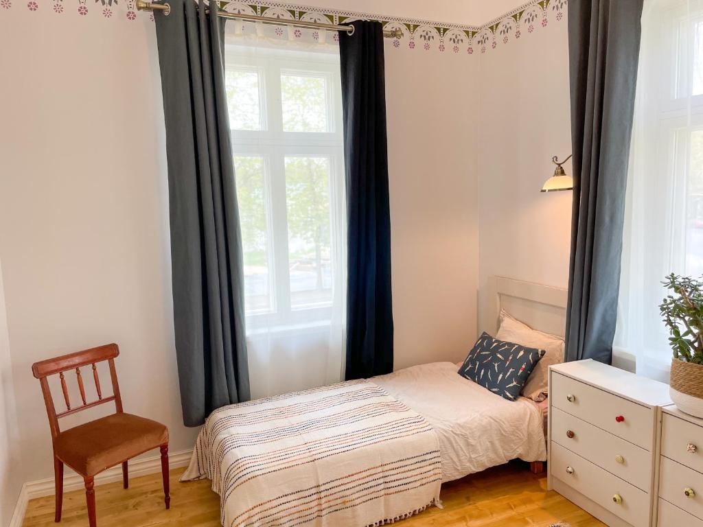 Postel nebo postele na pokoji v ubytování Spacious Supeluse Apartment