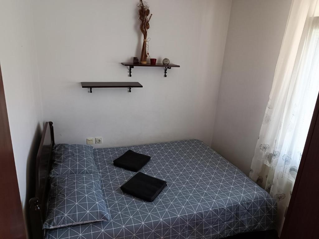 Postel nebo postele na pokoji v ubytování Serbian home with garden