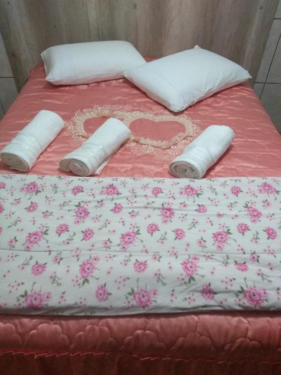 Postel nebo postele na pokoji v ubytování Casa e Flat Conforto Gramado