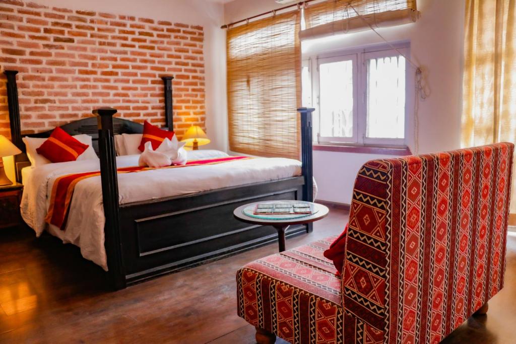 Postel nebo postele na pokoji v ubytování Hotel ThorongLa Thamel