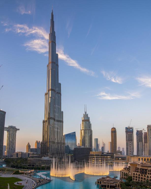 Hotel FIRST CLASS 3BR with full BURJ KHALIFA VIEW, a view of the worlds tallest building with a fountain at FIRST CLASS 3BR with full BURJ KHALIFA VIEW in Dubai