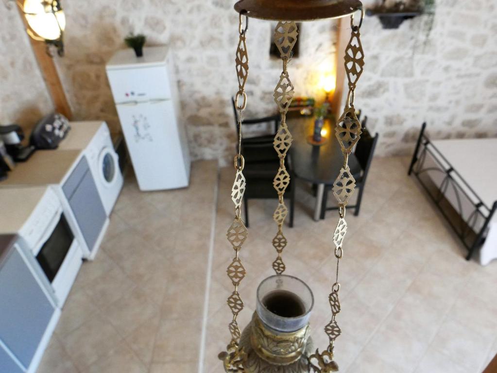 Kuchyň nebo kuchyňský kout v ubytování Το Λαϊνάκι by Fox Tale Guest House