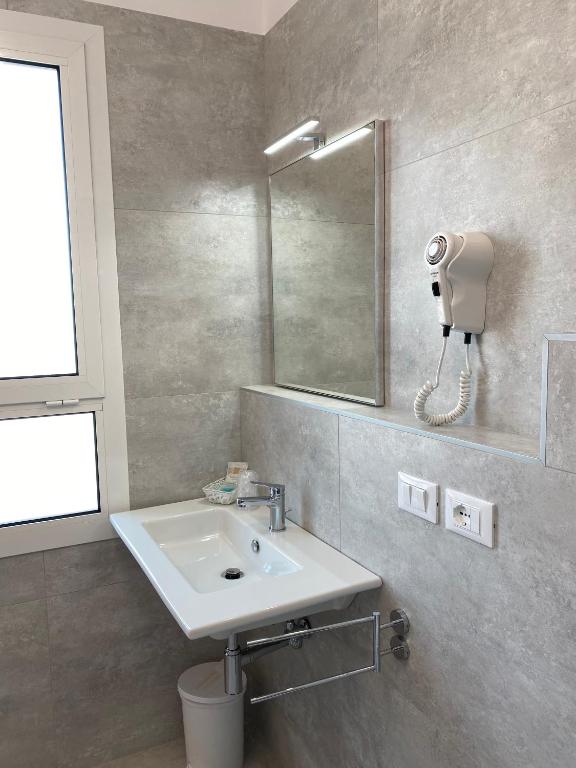 Koupelna v ubytování Hotel Linda