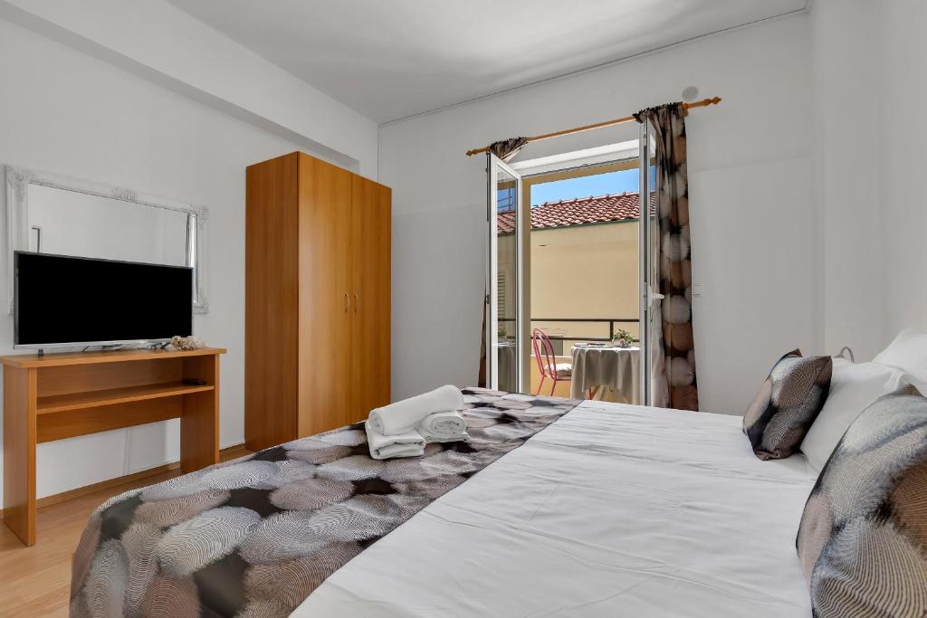 Posteľ alebo postele v izbe v ubytovaní Apartments Danica Drašnice