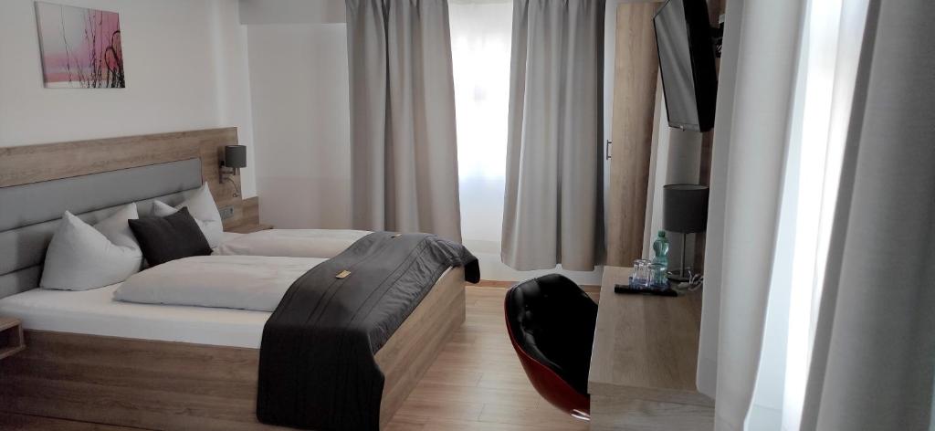 Postel nebo postele na pokoji v ubytování Hotel & Restaurant Adler Ittendorf - 24h Self-CheckIn