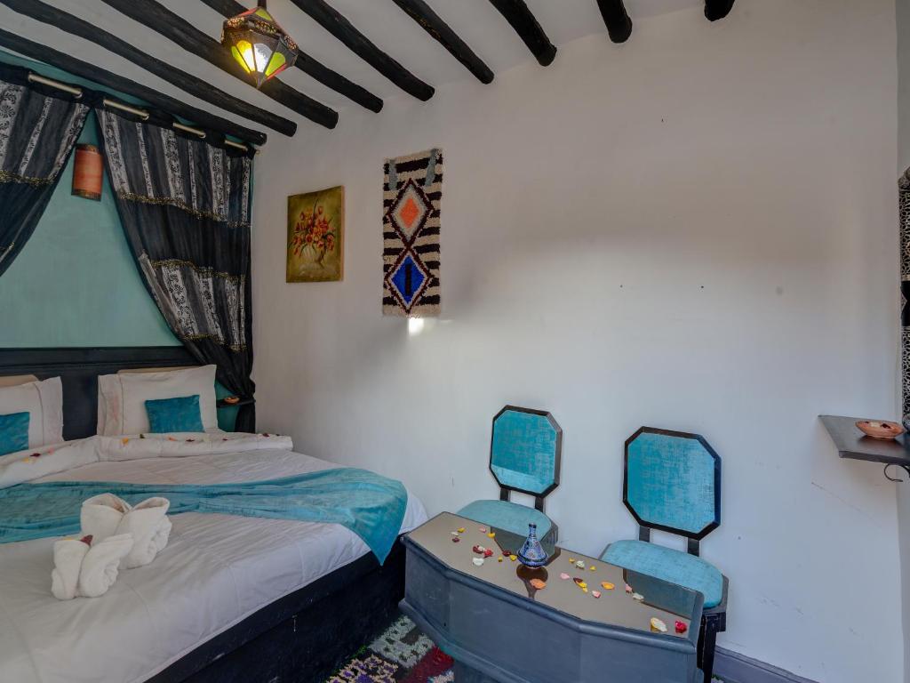 Postel nebo postele na pokoji v ubytování Riad Lazorde De Marrakech