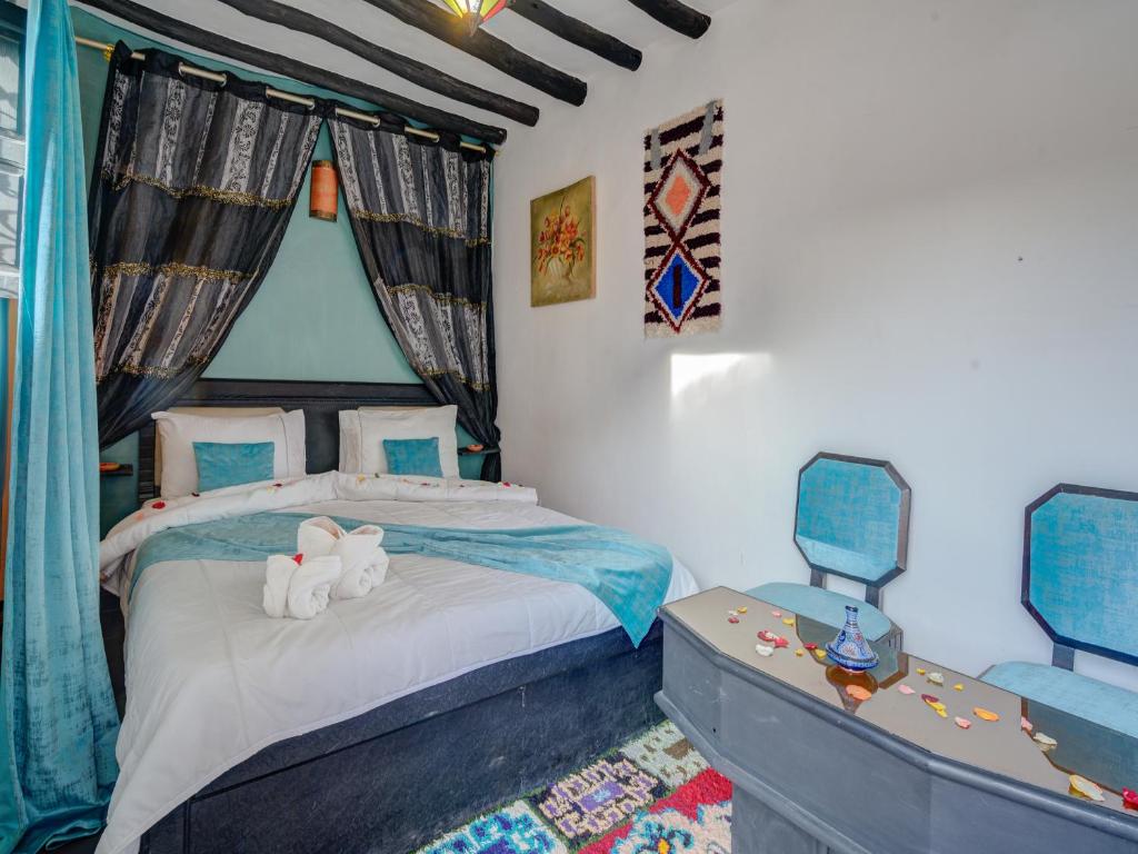 Postel nebo postele na pokoji v ubytování Riad Lazorde De Marrakech