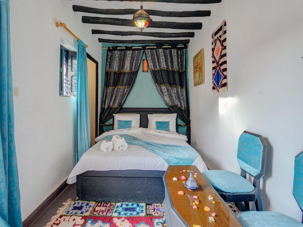 Postel nebo postele na pokoji v ubytování Riad Lazorde De Marrakech