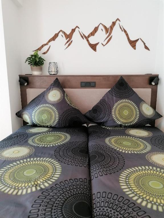 Postel nebo postele na pokoji v ubytování Hölbinger Alm - Apartments