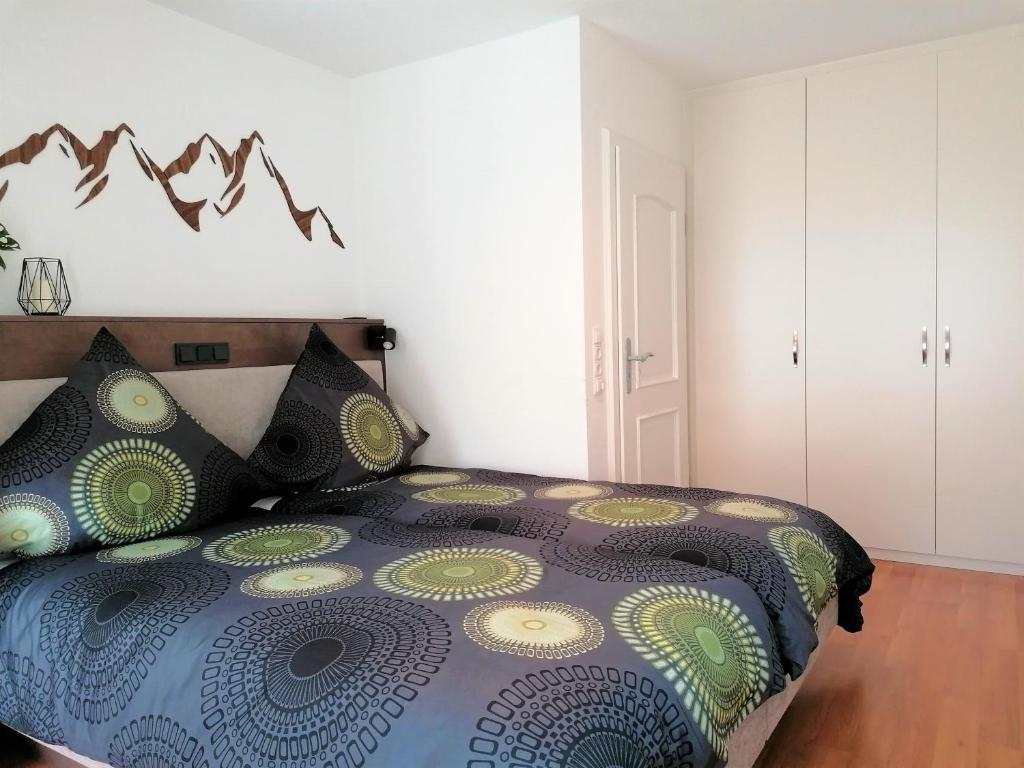 Postel nebo postele na pokoji v ubytování Hölbinger Alm - Apartments