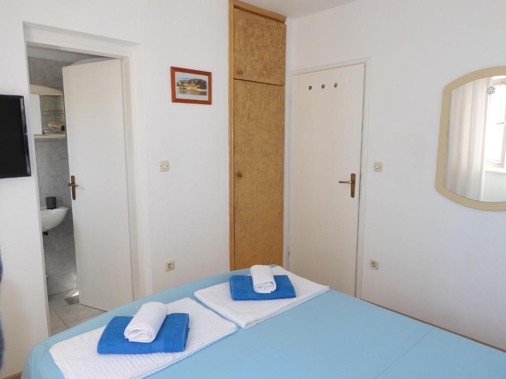 Posteľ alebo postele v izbe v ubytovaní Jagoda Apartman