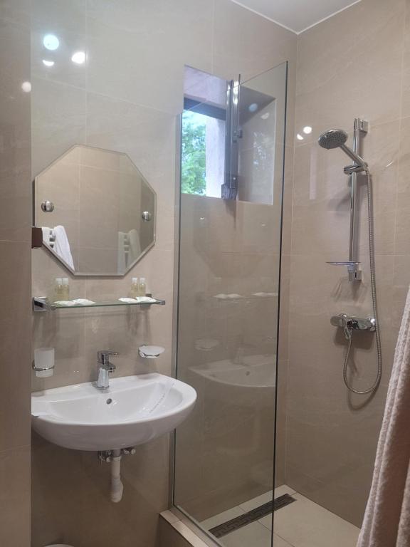 Koupelna v ubytování Hotel Kreta