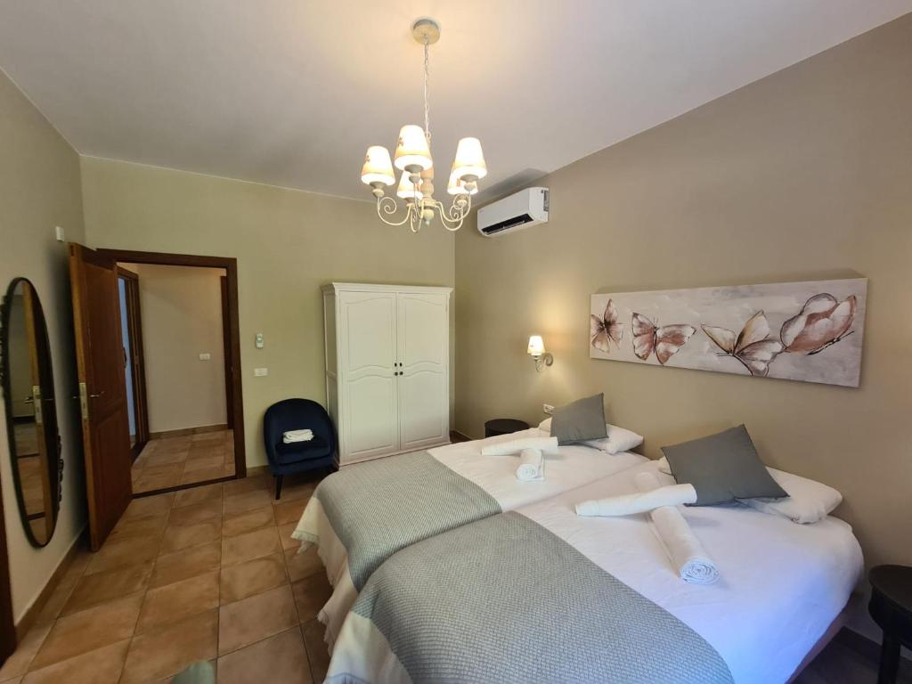 Postel nebo postele na pokoji v ubytování Haciendita Gomera