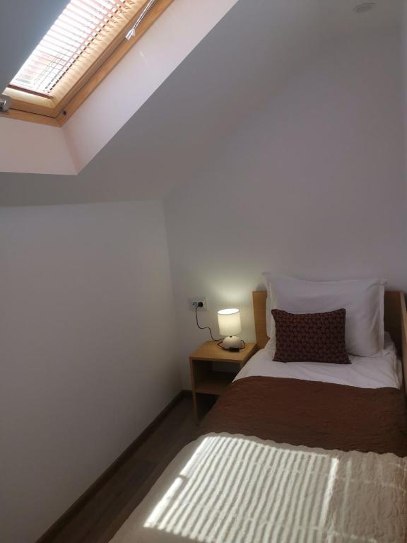 Postel nebo postele na pokoji v ubytování Saint Maria Guest House