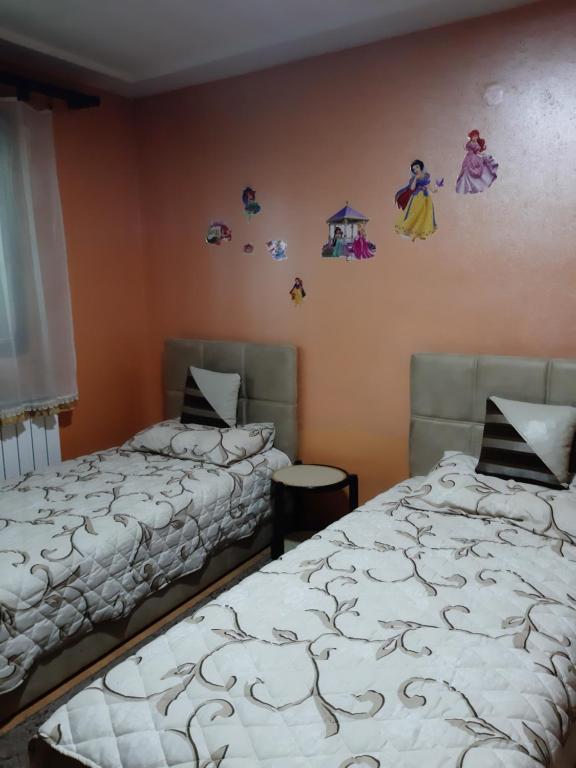 Postel nebo postele na pokoji v ubytování Vila Mir