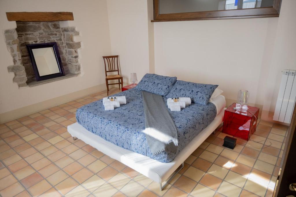 Postel nebo postele na pokoji v ubytování Ercole