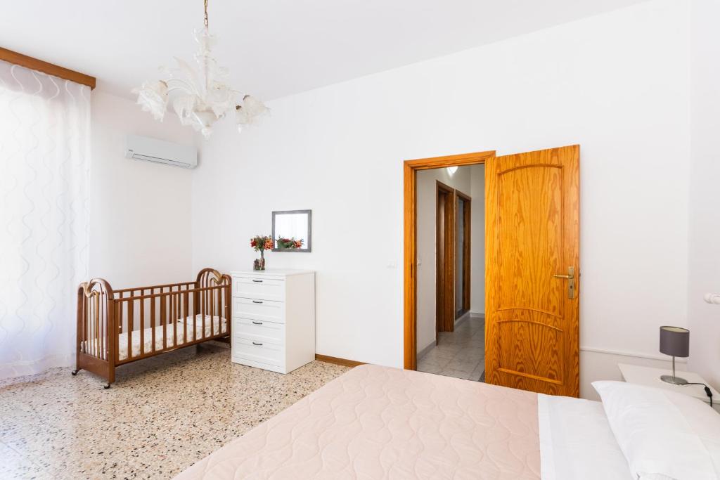 A bed or beds in a room at Paco House