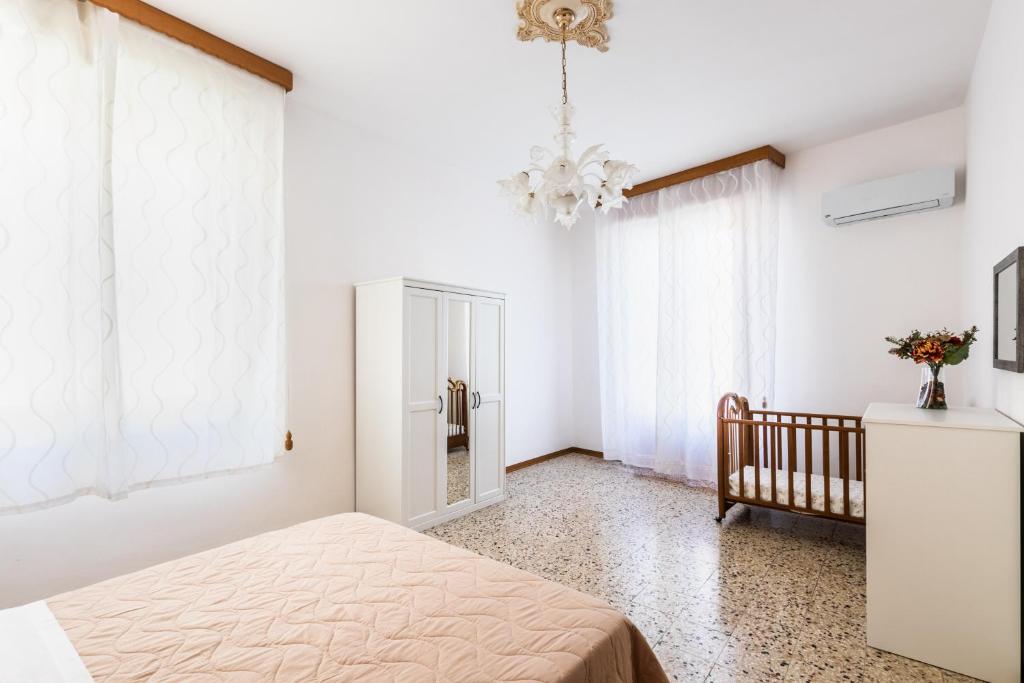A bed or beds in a room at Paco House