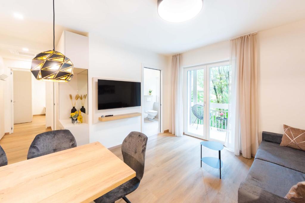Televízia a/alebo spoločenská miestnosť v ubytovaní CityPointapartments-Park