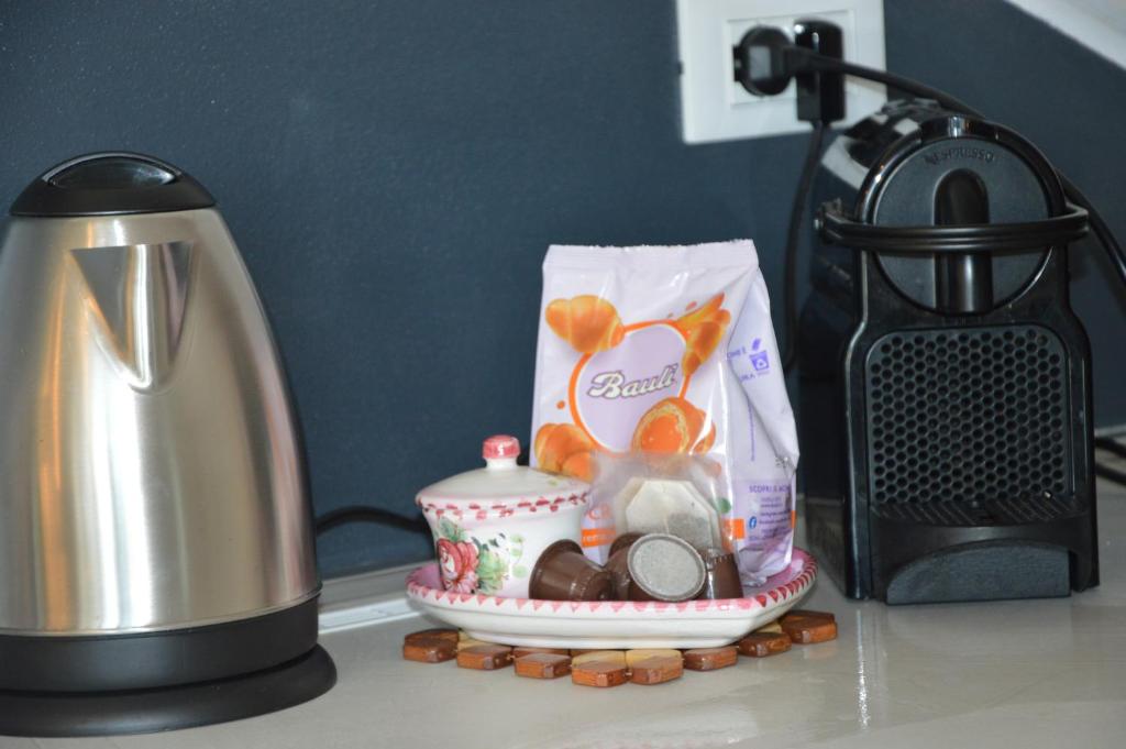 Coffee and tea making facilities at White suite - Jacuzzi, Swimming pool & Lake view