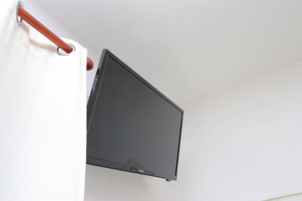 TV a/nebo společenská místnost v ubytování Bora Rooms