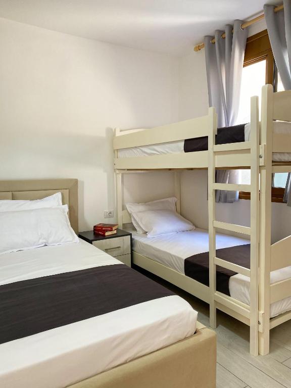Postel nebo postele na pokoji v ubytování Sunny guest house