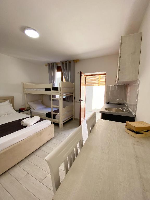 Postel nebo postele na pokoji v ubytování Sunny guest house