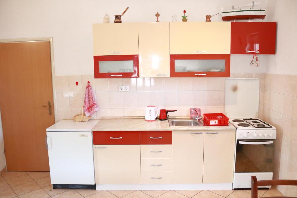 Kuchyň nebo kuchyňský kout v ubytování Olive apartments 2