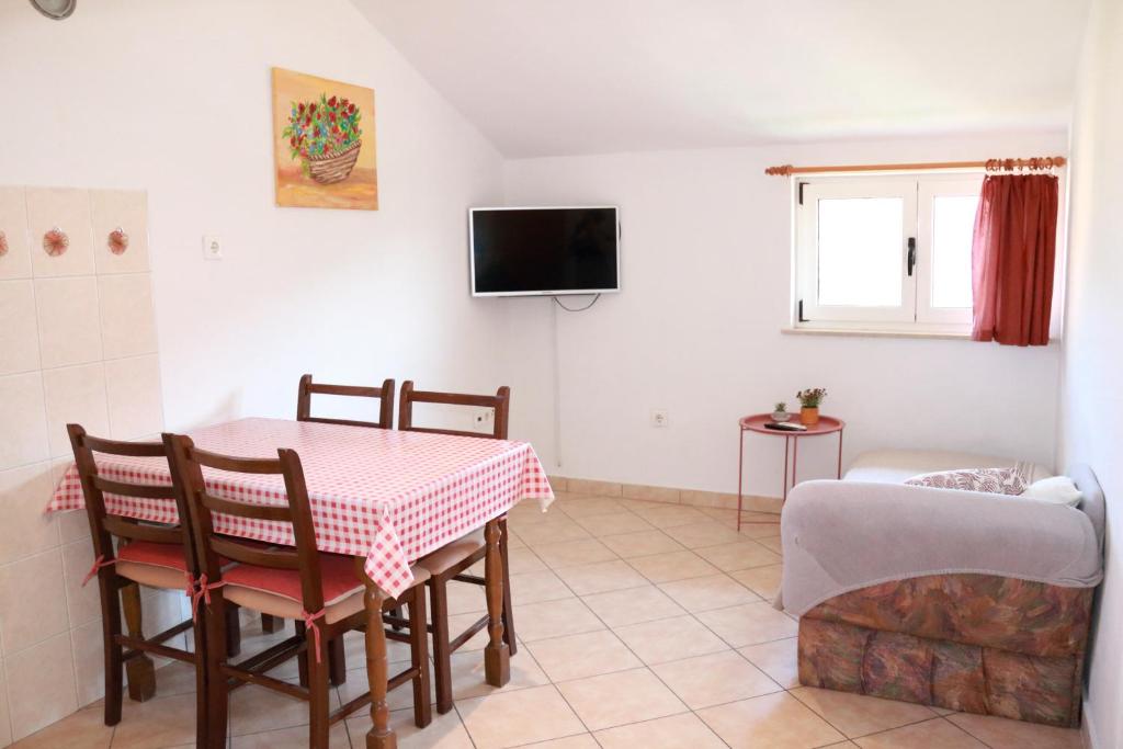 TV a/nebo společenská místnost v ubytování Olive apartments 2