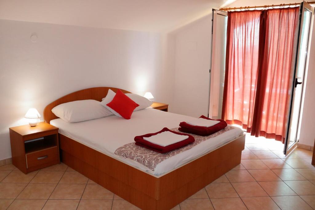 Postel nebo postele na pokoji v ubytování Olive apartments 2