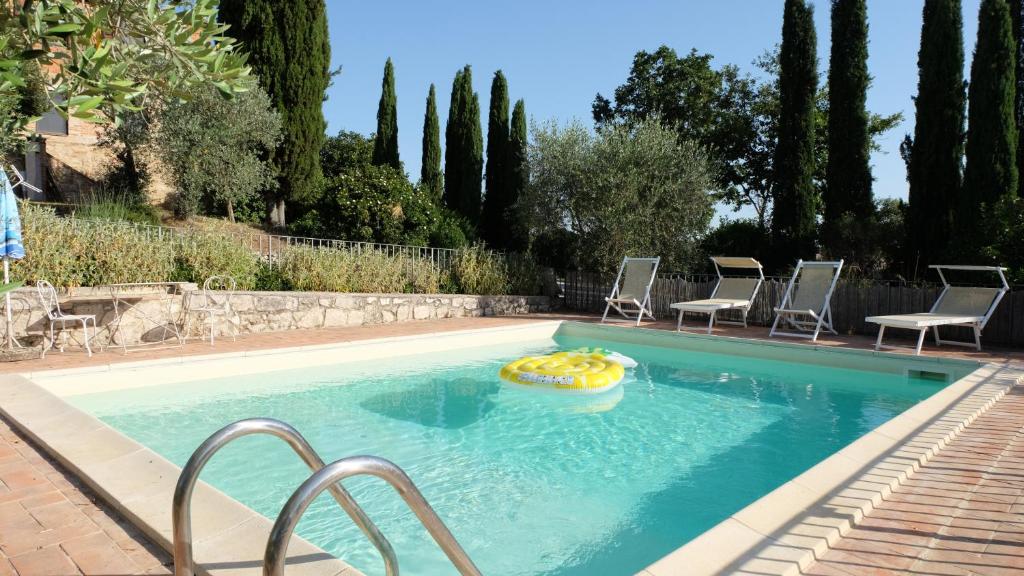 Swimmingpoolen hos eller tæt på Il Capanno