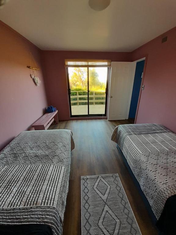 Postel nebo postele na pokoji v ubytování Casa Pascuala