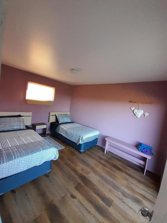 Postel nebo postele na pokoji v ubytování Casa Pascuala