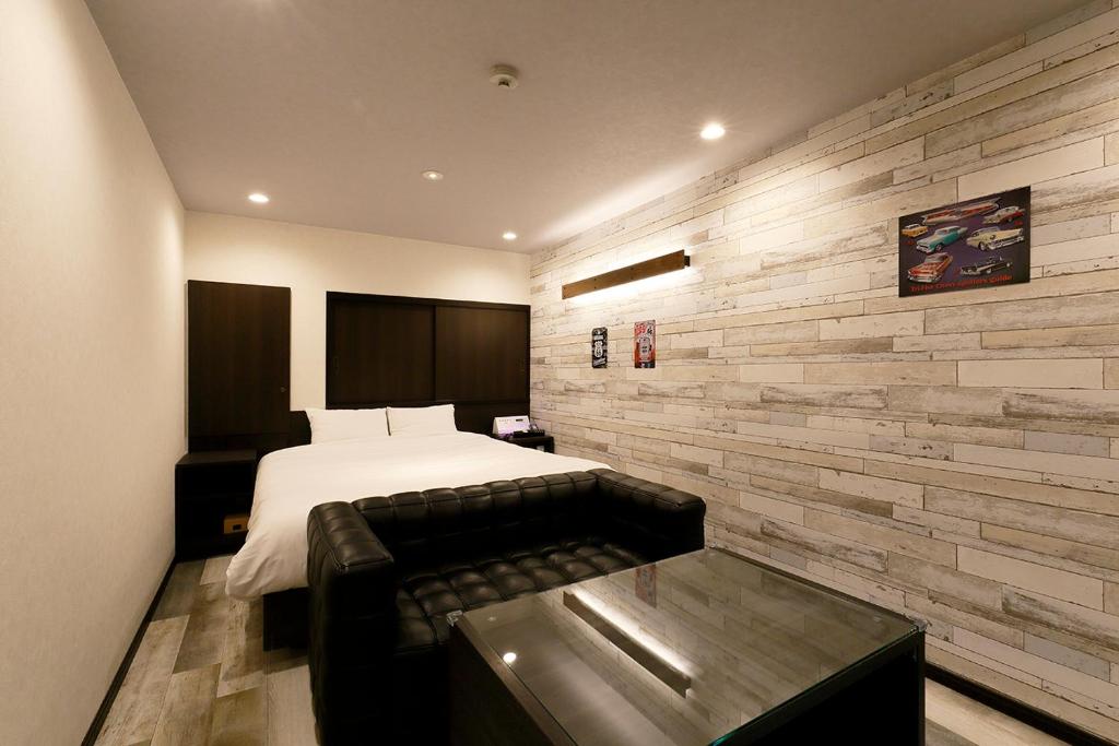 Postel nebo postele na pokoji v ubytování 555MOTEL SHONAN