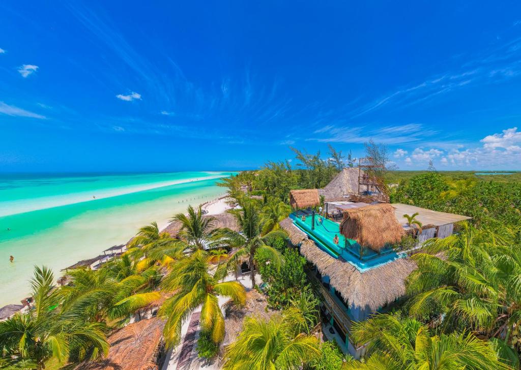 an aerial view of a resort on a beach at Hotel Villas Tiburon in Holbox Island