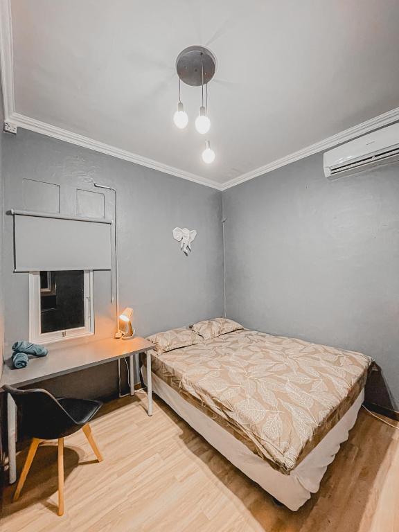 Letto o letti in una camera di OstiC House