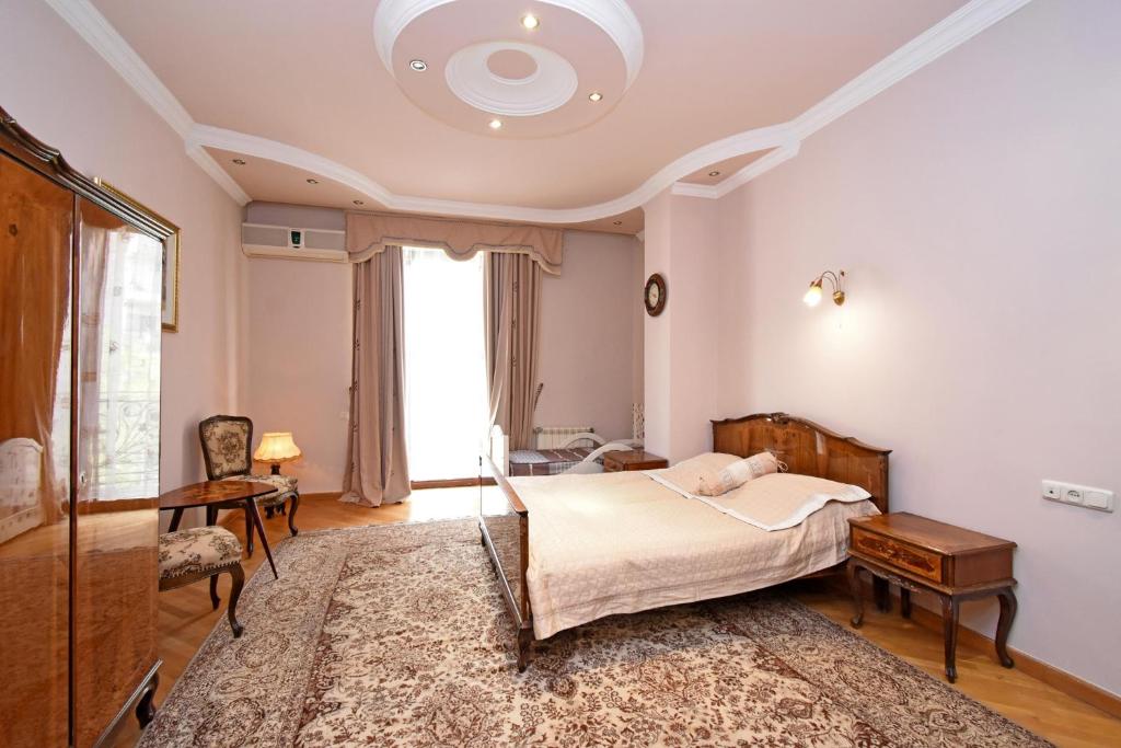 Postel nebo postele na pokoji v ubytování Guest house YEREVAN